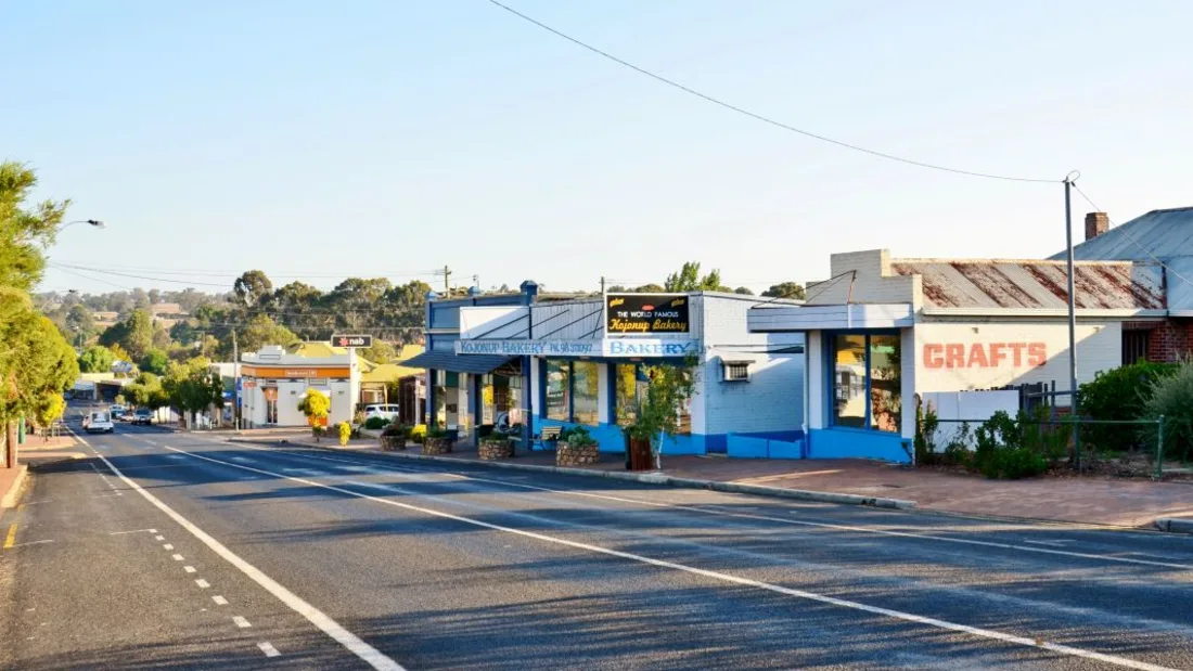 Golden hour on Albany Highway where it runs through the centre of Kojonup, past the town bakery